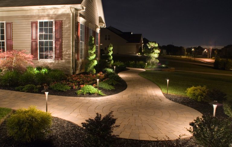 Home with outdoor lighting example. Moore's Irrigation Landscape Lighting services in Omaha